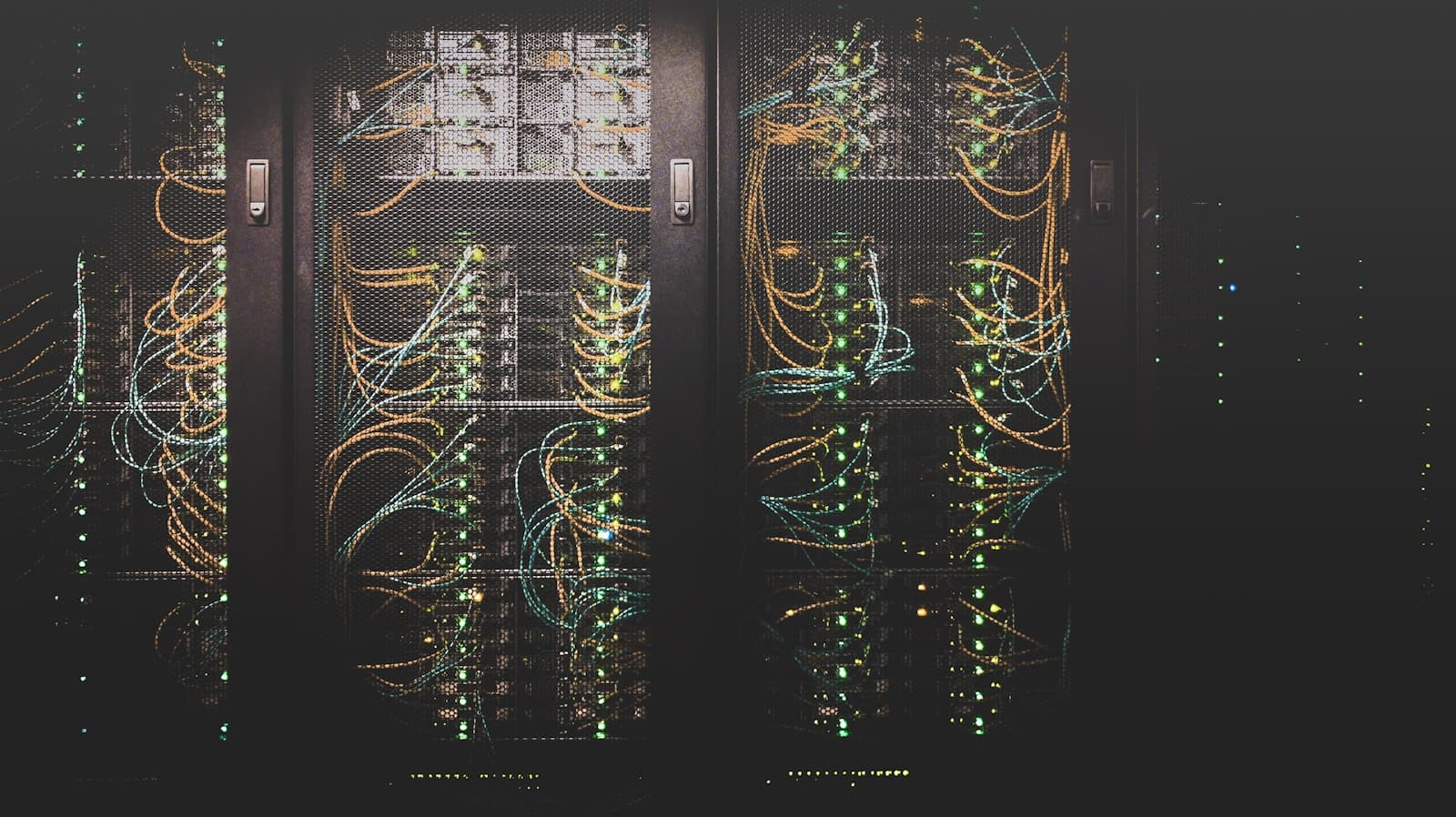 Rows of servers inside a modern data center, used as context for Oracle's AI infrastructure spending story.
