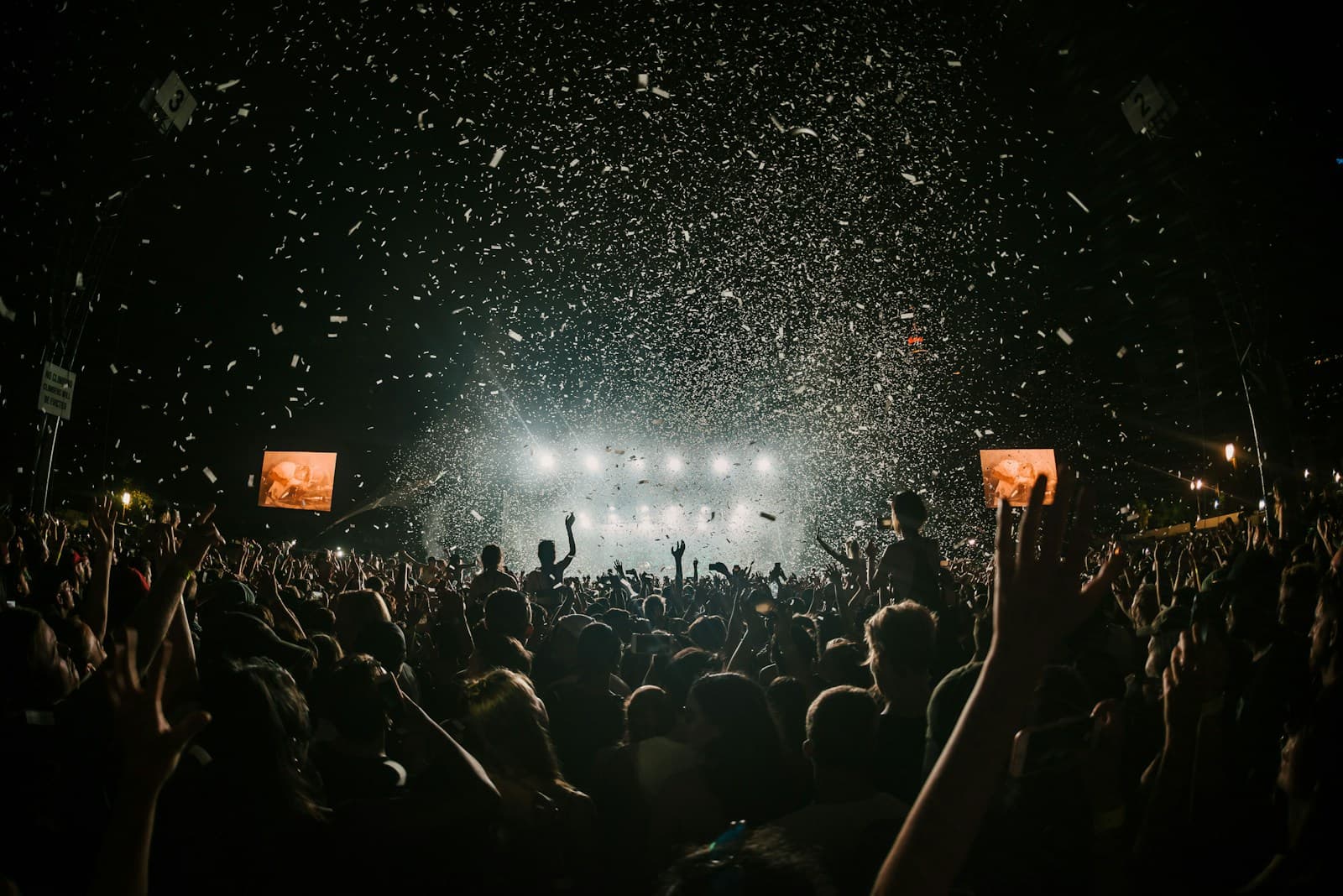 Illustrative photo of a crowded public festival at night, used for coverage of public-safety questions after a Toledo festival shooting.