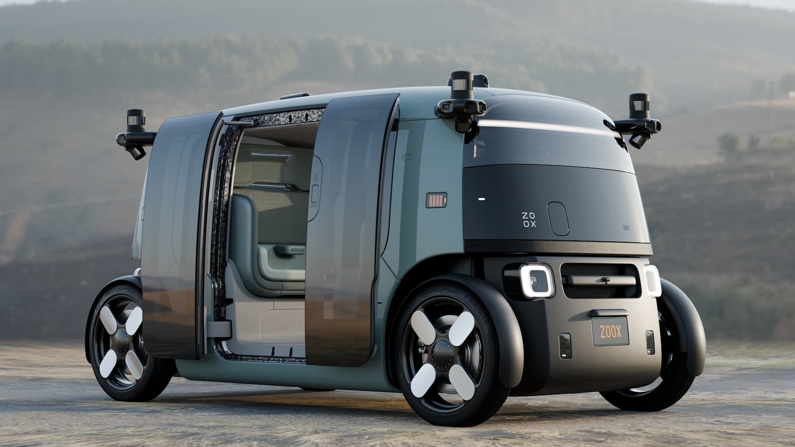 Zoox purpose-built robotaxi shown from the front and side